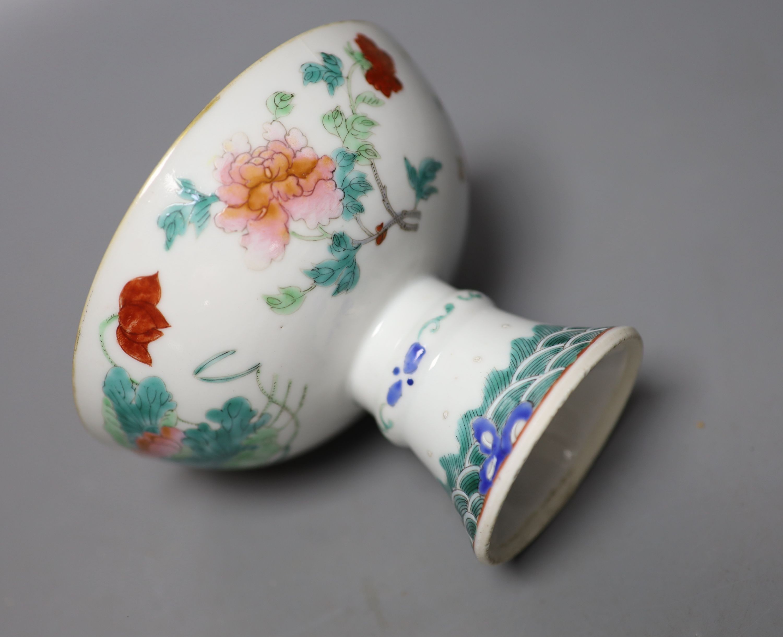 A 19th century Chinese famille stem cup, 12cm diameter